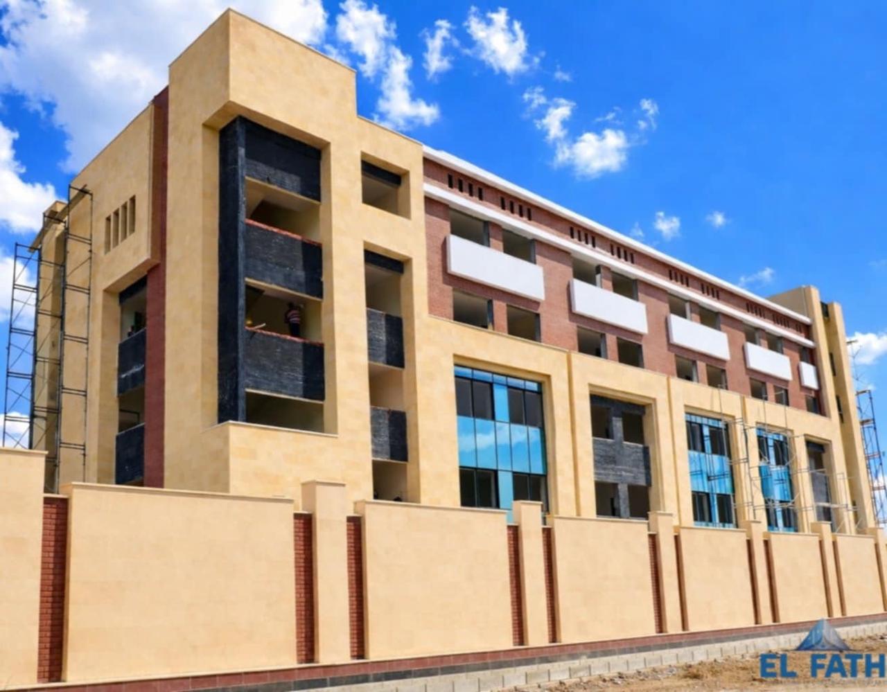 Classroom wing behind the campus wall