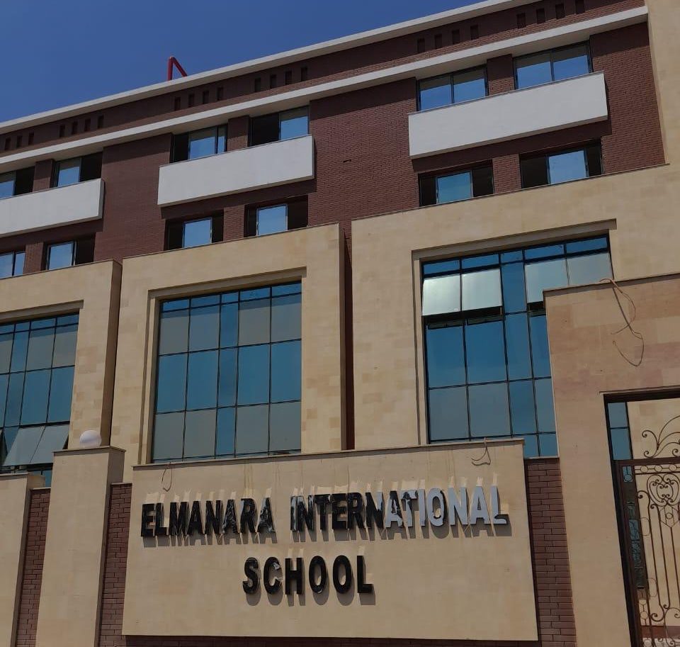 The El Manara International Schools entrance signage